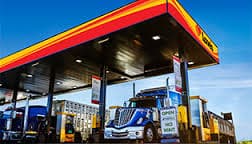 A truck refueling at a Love's gas station.